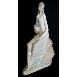 NAO by LLADRO Porcelain Girl Sitting on Rocks with Jug 9.5” tall Figurine # 31
